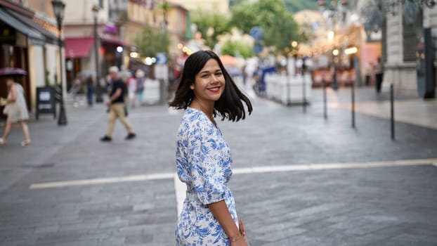 Beautiful young mixed race woman in the old town of Nice