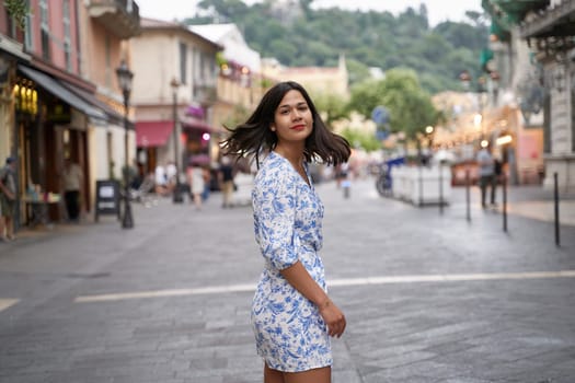 Beautiful young mixed race woman in the old town of Nice