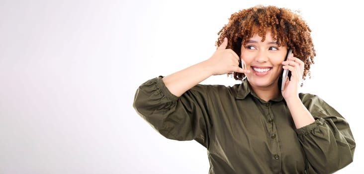 Phone call, mockup and hand gesture by woman happy for mobile communication by young female with copy space. Talking, conversation and person with 5g service isolated in a studio white background.