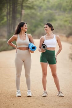 Fitness, start or happy friends in nature for yoga exercise, cardio workout or body training on mat. Healthy athlete girls smile, relaxed women or fun people ready for outdoor exercising together.