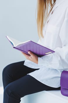 Notebook for business notes of purple color. Women's case notebook