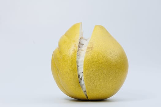 Pomelo fruit isolated on white background, tropical exotic citrus fruit