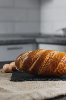 Delicious freshly baked homemade bread. Rye pastry. Flour bakery products.