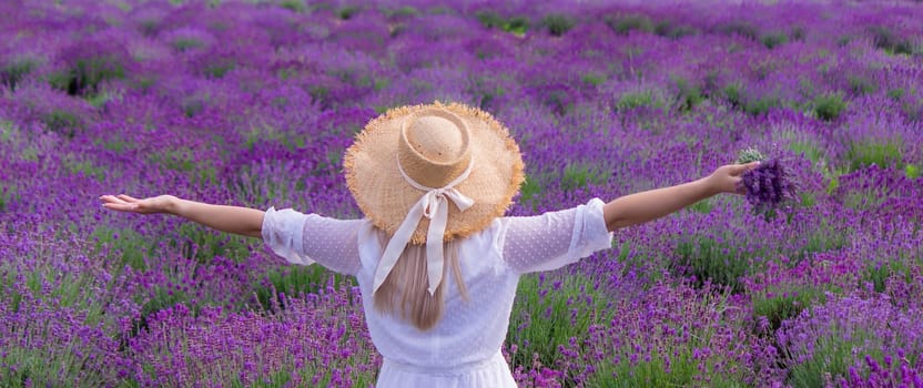 girl in lavender field. Selective focus. Nature