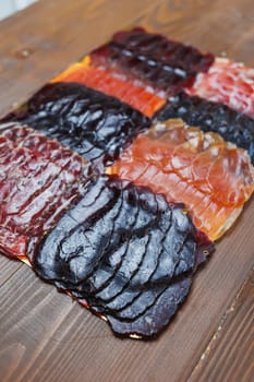 Dried meat for sandwiches. Thinly sliced smoked meat. Meat cuts. Hamon