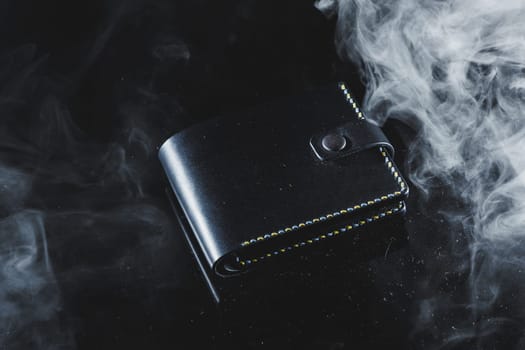Black men's wallet made of genuine leather. Men's black purse.