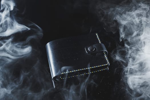 Black men's wallet made of genuine leather. Men's black purse.
