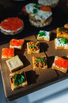 Meat spread on toasted bread with greens. Fresh, delicious croutons made from whole grain bread