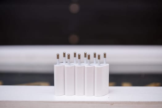 Chargers blocks for charging the phone in white.