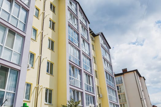 New building unfinished multi-storey residential building. Modern residential building. Housing stock. Building against the sky
