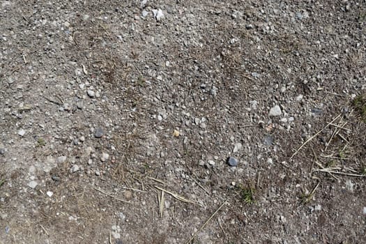 Sand and stones on a gravel ground texture in high resolution