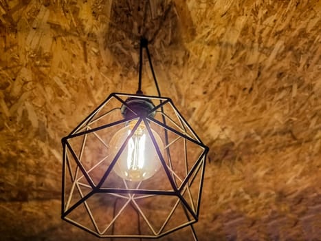 Black minimalist lamp in interior. Loft lamps, vintage, retro, scandi style.
