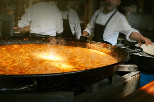 Seafood paella freshly prepared on a street food market