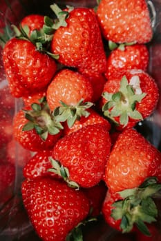 Fresh strawberries on the street, closeup overhead