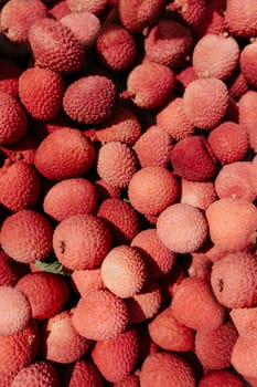 Fresh lychee fruit pattern, overhead view