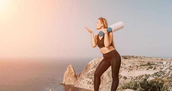 Fitness woman sea. Outdoor workout on yoga mat in park near to ocean beach. Female fitness pilates yoga routine concept. Healthy lifestyle. Happy fit woman exercising with rubber band in park.