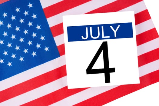 4 th July calendar with part of an American flag on white background.USA Independence Day date.