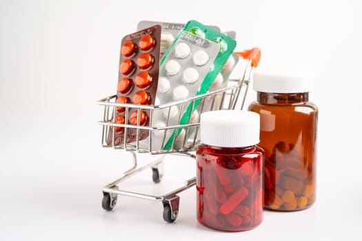 Drug capsule pill from drug prescription in in shop trolley at drugstore, pharmacy for treatment health medicine.