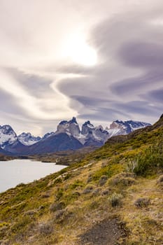 Upright image of the mountains at Torres del Paine mountain massif with spectacular clouds, national park, Chile, Patagonia, South America