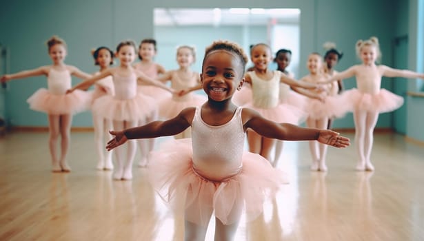 Proud African american little girl on ballet wearing a pink tutu skirt. Children standing in ballet poses in studio. Graceful ballerinas dancing together in studio having fun education children