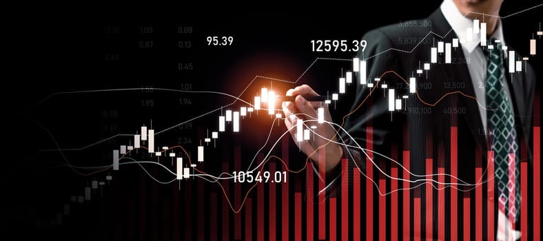 Businessman analyst working with digital finance business data graph showing technology of investment strategy for perceptive financial business decision. Digital economic analysis technology concept.