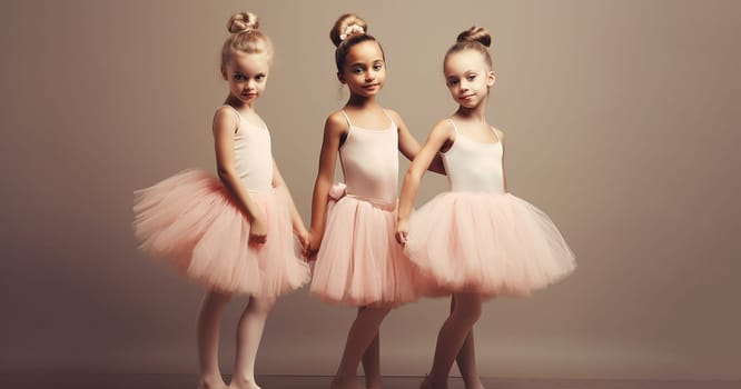 Cute ballerina little girls in pink tutu dance practice in the room, kid ballet concept. Adorable children dancing together classical ballet in studio cute performance in pink