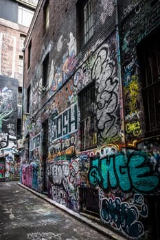 MELBOURNE, AUSTRALIA - June 25 2023: Melbourne's famous Hosier Lane featuring graffiti artwork and grunge urban feel