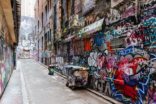 MELBOURNE, AUSTRALIA - June 25 2023: Melbourne's famous Hosier Lane featuring graffiti artwork and grunge urban feel