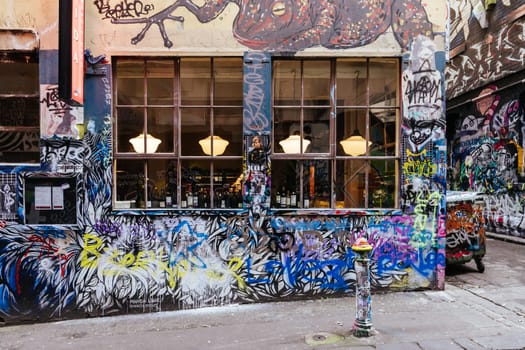 MELBOURNE, AUSTRALIA - June 25 2023: Melbourne's famous Hosier Lane featuring graffiti artwork and grunge urban feel