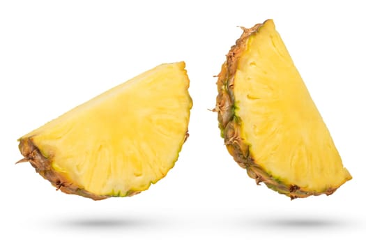 Pieces of ripe pineapple on a white isolated background. Pieces and slices of pineapple with a peel of different cutting methods from different sides. Isolate pieces of pineapple