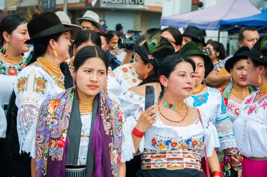 Otavalo, Ecuador - 24 de junio de 2023: beautiful women from otavalo with traditional dresses in the festival of inti raymi. High quality photo