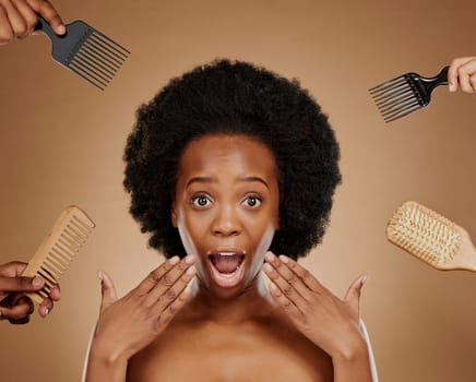 Portrait, wow and hands in a salon with a black woman in studio on a brown background for beauty or cosmetics. Face, afro and hair with a young female person looking surprised at natural care options.