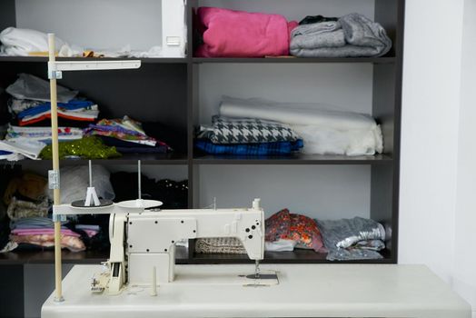 Sewing machine on table in workshop