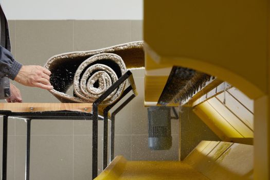 Process of working on automatic machine for dirty carpet washing and dry cleaning