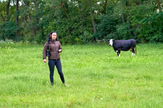 land covered with grass and other low plants suitable for grazing animals, especially cattle or sheep