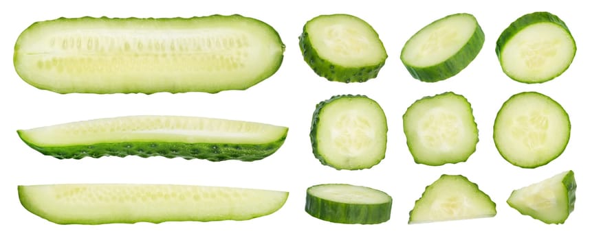 Slices of green cucumbers on a white isolated background. Cucumber slices hanging or falling on white. The concept of a delicious addition to a salad. High quality photo.