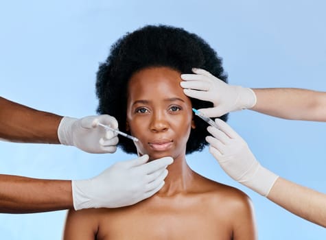 Black woman, facial injection and beauty in portrait, cosmetic procedure, lip filler and dermatology on blue background. Liquid collagen, face and skincare with female model and treatment in studio.