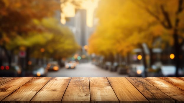 The empty wooden table top with blur background of business district and office building in autumn. Exuberant image.