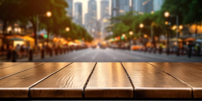 The empty wooden table top with blur background of street in downtown business district with people walking. Exuberant image.
