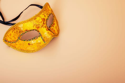 Carnival mask on color background. Purim celebration concept (jewish carnival holiday). Masquerade party or celebration concept.