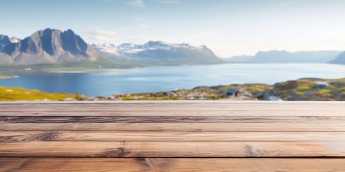 The empty wooden brown table top with blur background of Greenland in summer. Exuberant image.