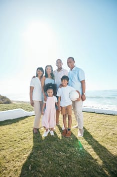 Family, portrait and outdoors with happiness in nature with ball in mockup space with children. Happy, parents and generations are standing in garden or summer for bond or quality time together
