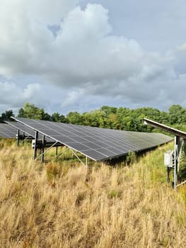 Generating clean energy with solar modules in a big park in northern Europe.