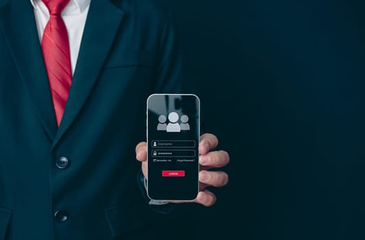 Login. A businessman's finger is holding a phone. Represents protection against external hacks. Concept of protection against code, viruses, firmware, and malware.