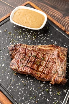 New York Strip Loin on stone cutting board at steak house