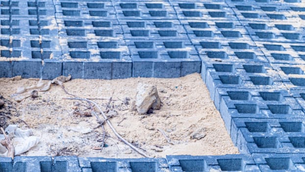 under construction walkway surface Floor with gray color concrte grass blocks