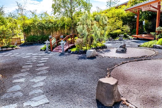 Traditional zen Japanese garden landscape design decoration with tree and rock