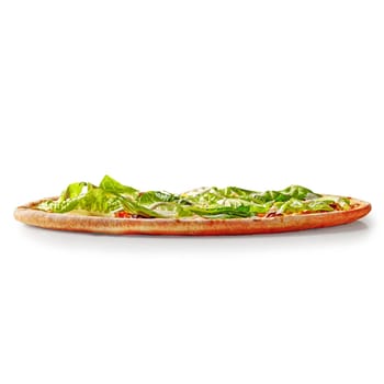 Thin pizza with browned crispy edge filled with chicken, tomatoes and red beans topped with fresh romaine lettuce and cream cheese sauce, isolated on white background. Italian style cuisine