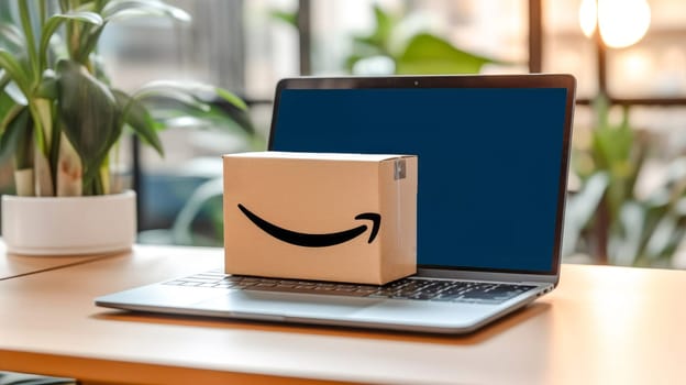 Delivered parcel box on table with laptop blurred home background. Amazon Prime shopping. Online shopping. Generative Ai