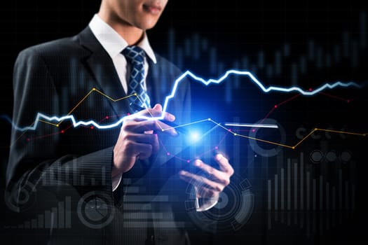 Businessman analyst working with digital finance business data graph showing technology of investment strategy for perceptive financial business decision. Digital economic analysis technology concept.